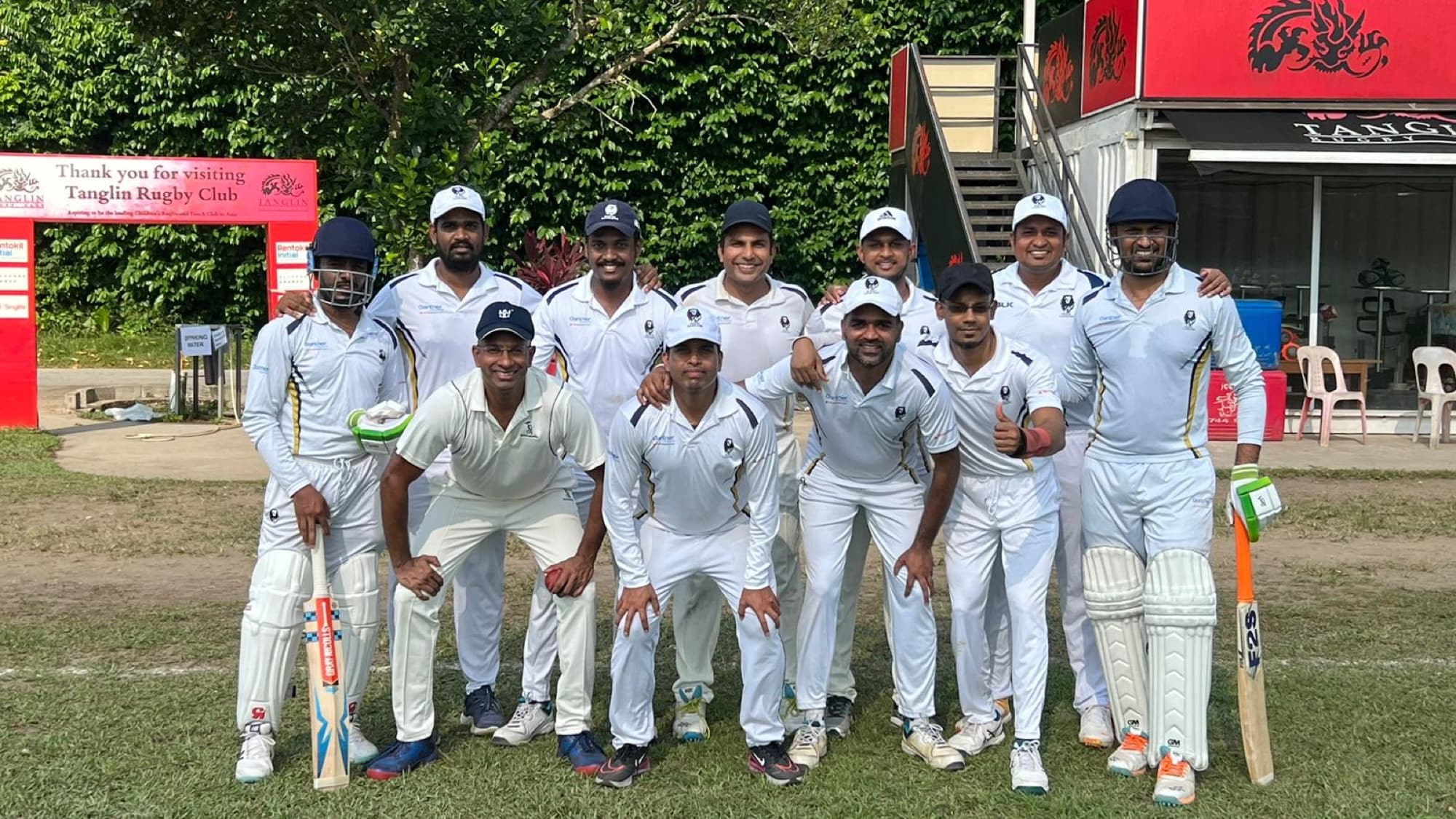 The SolidLankans side in whites before a match at Tanglin